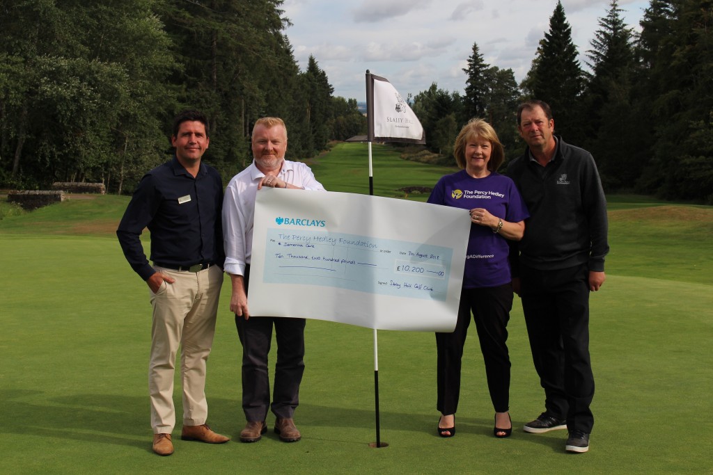 L-R Slaley Hall's Jonny Mould, Dr Fraser Quin from Dementia Care, Maria Hallett from The Percy Hedley Foundation and John Lee OBE, captain at Slaley Hall Golf club.