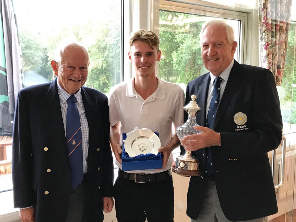 2018 Yorkshire Amateur Matchplay champion Max Berrisford is pictured centre after receiving his trophy.