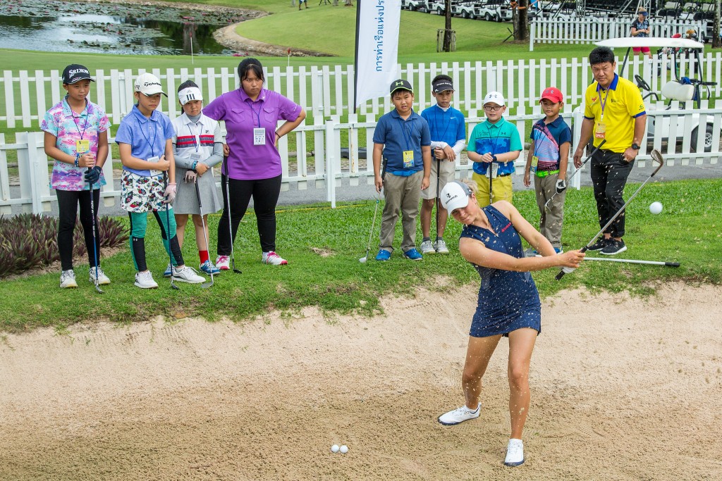 Former Surrey Girls junior Annabel Dimmock hosted a clinic with children at the Ladies European Thailand Open this week. Picture by TRISTAN JONES