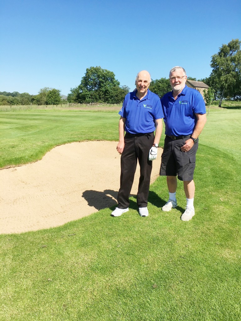Pictured near one of the new bunkers are senior captain Richard Spencer, left, and men’s captain Bill Simpson.