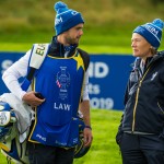 Bronte Law's caddie Jeff Brighton talks to Catriona Matthew during the Wednesday practice session