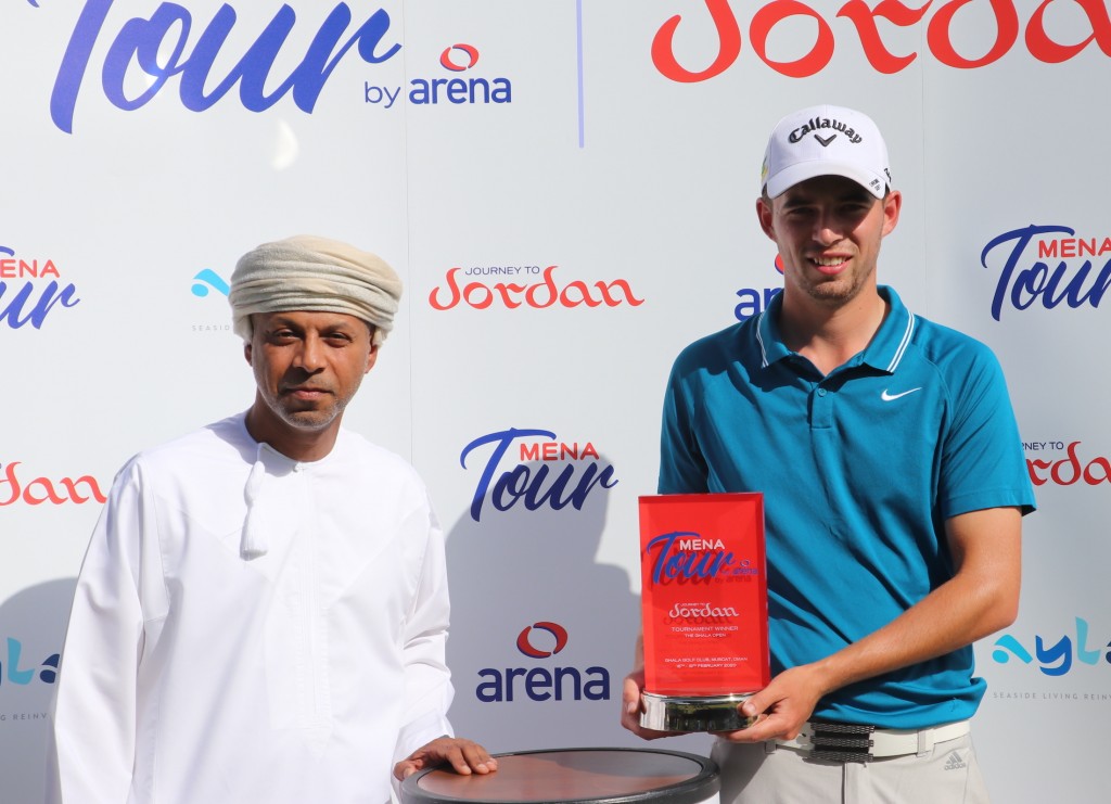 Bailey Gill receives his trophy from Ziyad Al Zubair, after winning the MENA Tour’s Ghala Open 