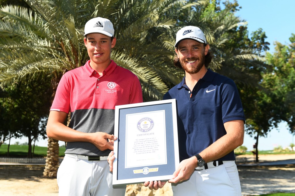 Tommy Fleetwood with Josh Hill, the youngest ever winner of an Official World Golf Ranking tournament at just 15 years old, in October 2020, at the Al Ain Open, on the MENA Tour,